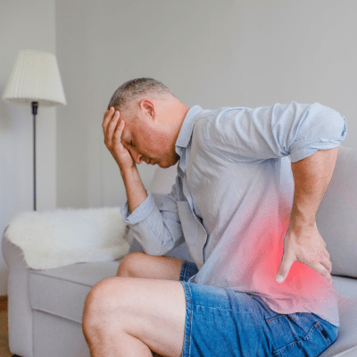 Person experiencing chronic back pain