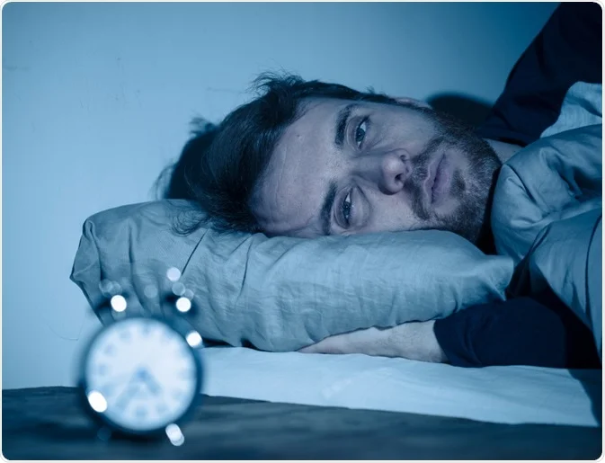 Person sleeping comfortably in bed